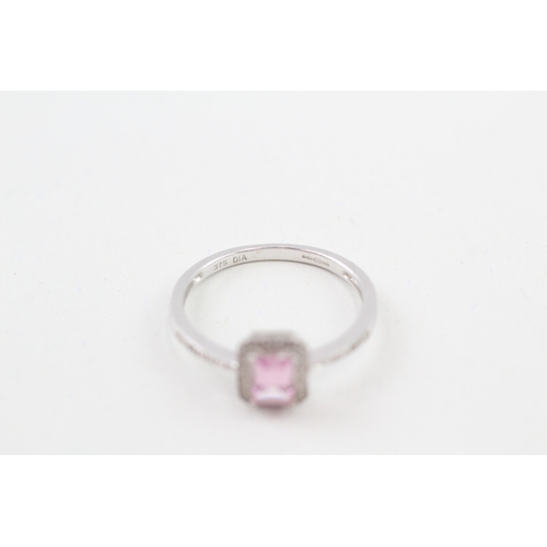 119 - 9ct gold pink gemstone & diamond halo ring (2.1g) Size  R