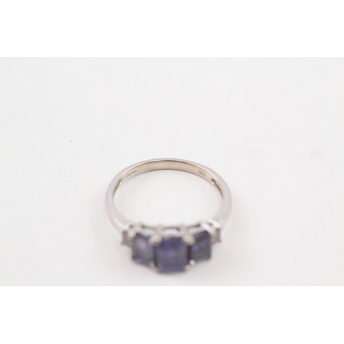 123 - 9ct gold emerald cut tanzanite & white sapphire dress ring (3.8g) Size  R