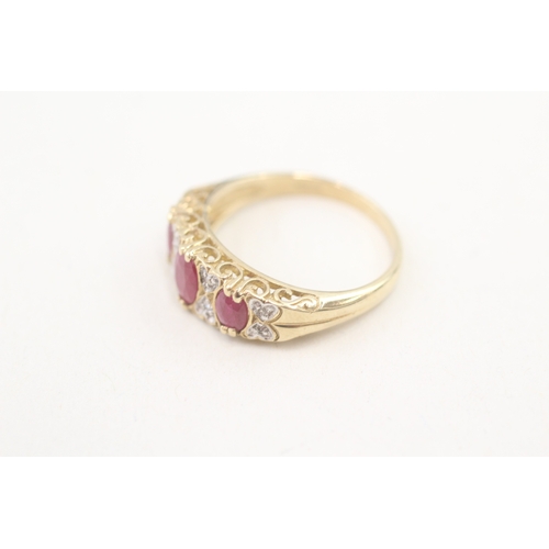 242 - 9ct gold diamond & ruby dress ring with heart motif (3.4g) Size  P