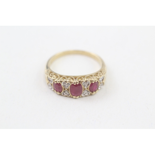 242 - 9ct gold diamond & ruby dress ring with heart motif (3.4g) Size  P