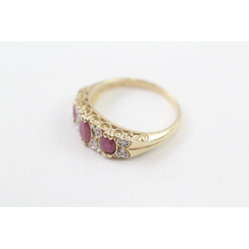 242 - 9ct gold diamond & ruby dress ring with heart motif (3.4g) Size  P