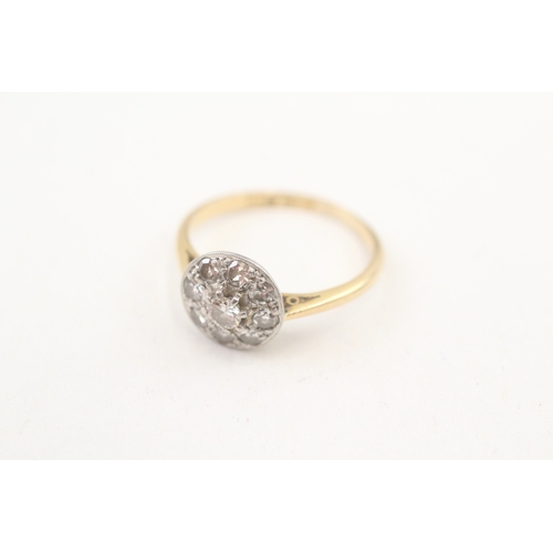 243 - 18ct gold diamond halo ring (2.4g) Size  L