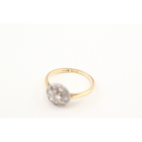 243 - 18ct gold diamond halo ring (2.4g) Size  L