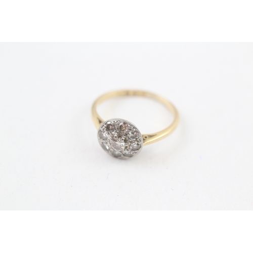 243 - 18ct gold diamond halo ring (2.4g) Size  L