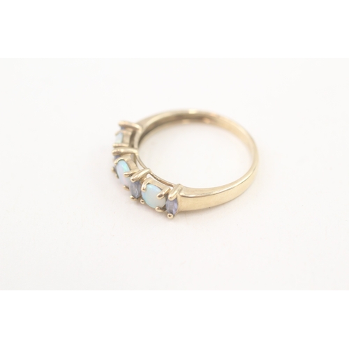 245 - 9ct gold opal & tanzanite seven stone ring (1.9g) Size  O