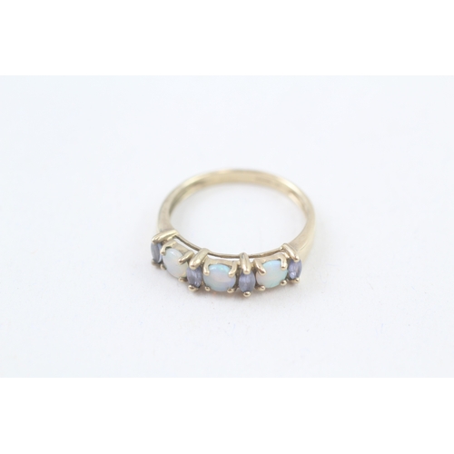 245 - 9ct gold opal & tanzanite seven stone ring (1.9g) Size  O