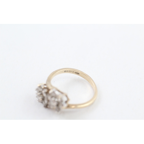 249 - 9ct gold cubic zirconia floral toi et moi ring (3g) Size  M