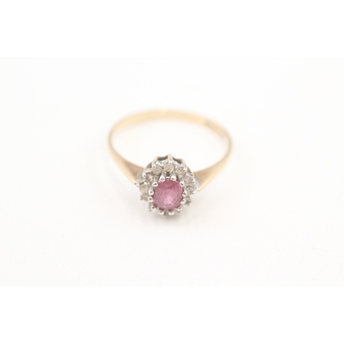 254 - 9ct gold diamond & ruby oval cluster ring (1.3g) Size  K 1/2