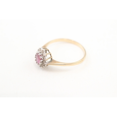 254 - 9ct gold diamond & ruby oval cluster ring (1.3g) Size  K 1/2