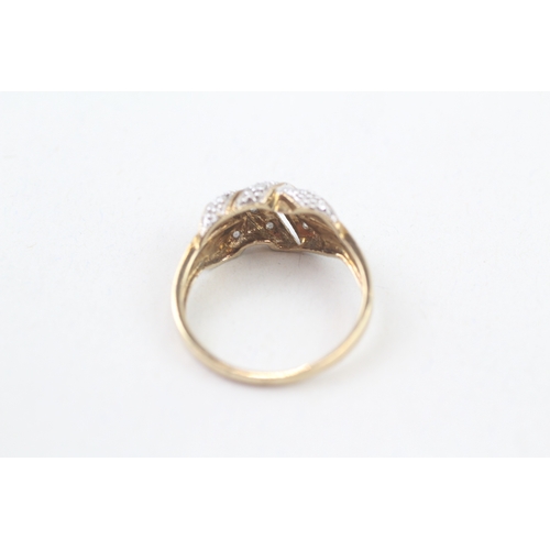 257 - 9ct gold diamond knot ring (2.2g) Size  P