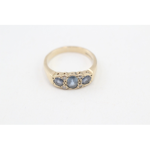 260 - 9ct gold diamond & sapphire seven stone ring (3.3g) Size  N