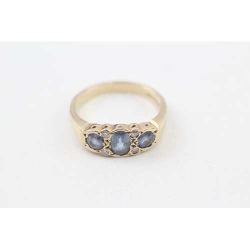 260 - 9ct gold diamond & sapphire seven stone ring (3.3g) Size  N