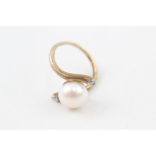 261 - 9ct gold diamond & cultured pearl dress ring (3.2g) Size  N