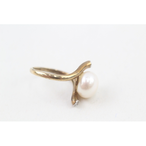 261 - 9ct gold diamond & cultured pearl dress ring (3.2g) Size  N