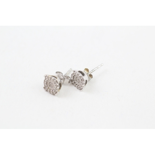 262 - 9ct white gold diamond halo stud earrings (1.1g)