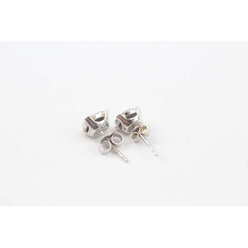 262 - 9ct white gold diamond halo stud earrings (1.1g)