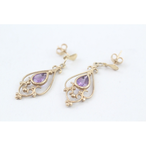 269 - 9ct gold amethyst openwork drop earrings (2.2g)