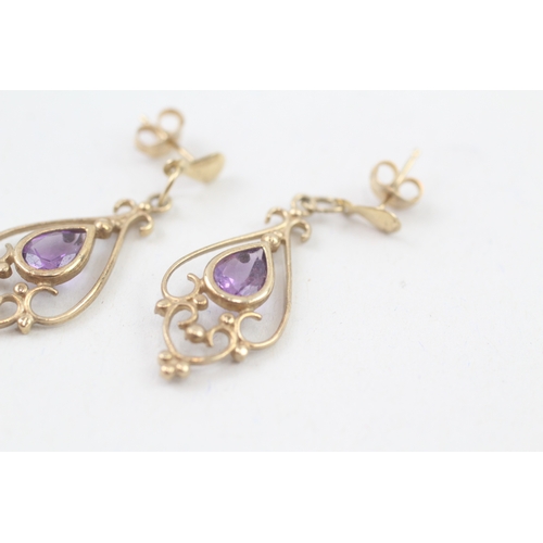 269 - 9ct gold amethyst openwork drop earrings (2.2g)