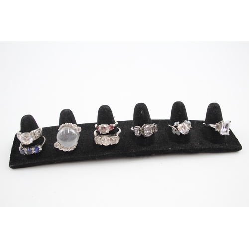 295 - A collection of silver Cubic Zirconia rings (46g)