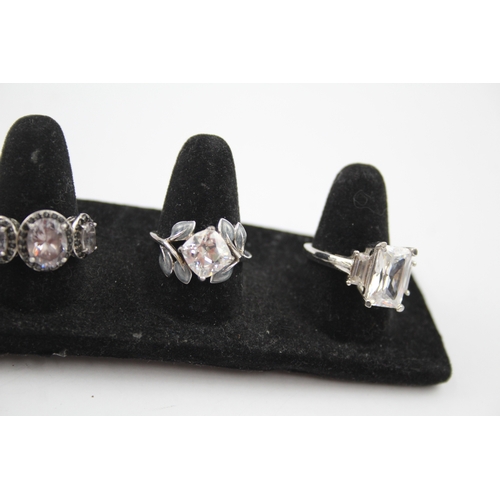 295 - A collection of silver Cubic Zirconia rings (46g)