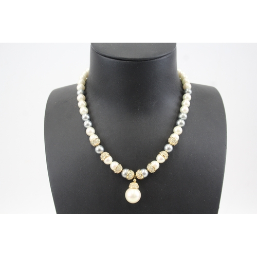 299 - Simulated pearl and rhinestone necklace by designer Christian Dior (43g)