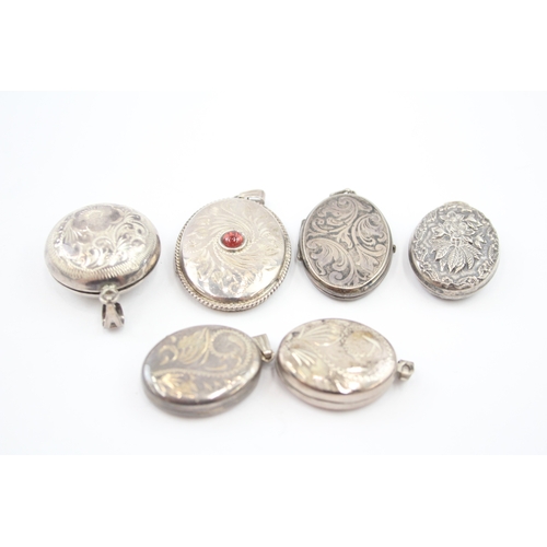 301 - Six silver locket pendants including gemstone (37g)