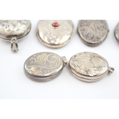 301 - Six silver locket pendants including gemstone (37g)