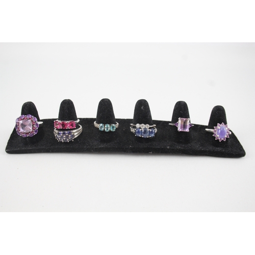 307 - A collection of silver gemstone rings including Diamond (32g)