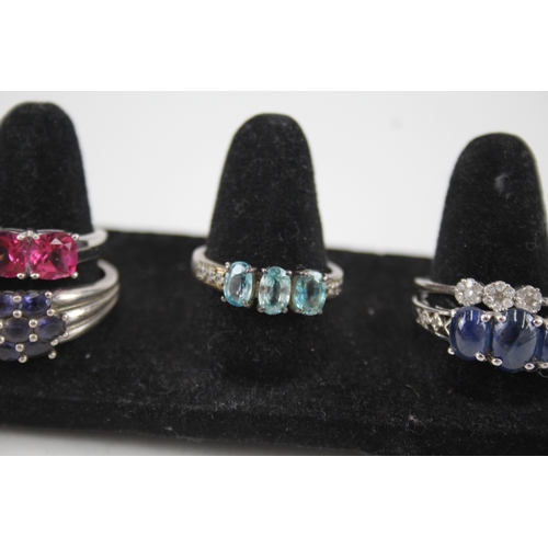 307 - A collection of silver gemstone rings including Diamond (32g)