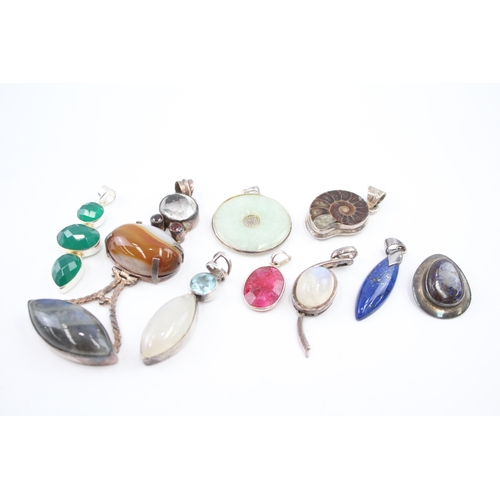 309 - A collection of silver gemstone pendants including boulder Opal (82g)