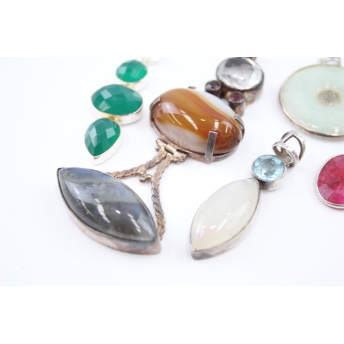 309 - A collection of silver gemstone pendants including boulder Opal (82g)