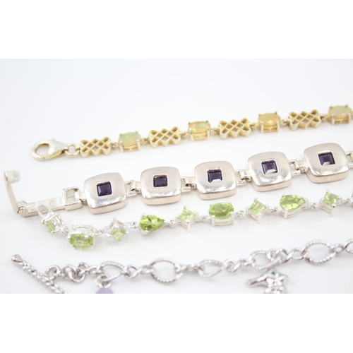 322 - Four silver gemstone bracelets including Opal (46g)