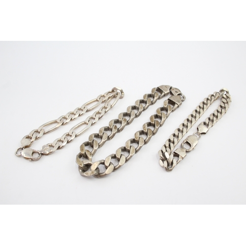 327 - Three silver chain bracelets including curb and figaro link (119g)