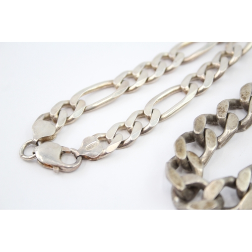 327 - Three silver chain bracelets including curb and figaro link (119g)