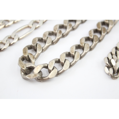 327 - Three silver chain bracelets including curb and figaro link (119g)