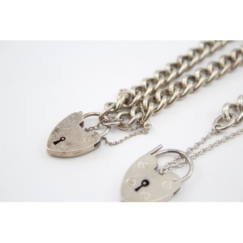 329 - Three silver curb bracelets with heart padlock clasps (71g)