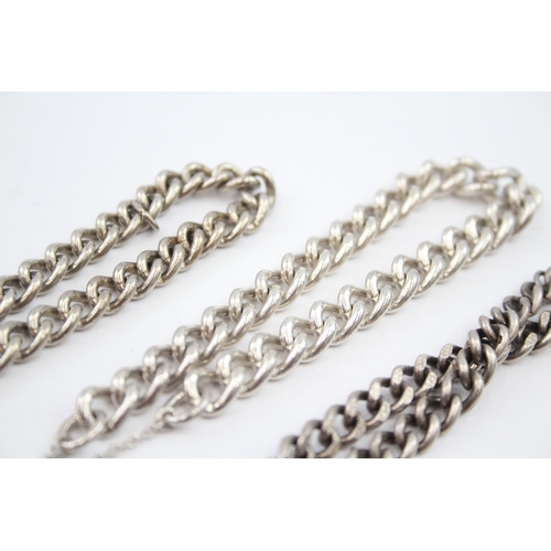 329 - Three silver curb bracelets with heart padlock clasps (71g)