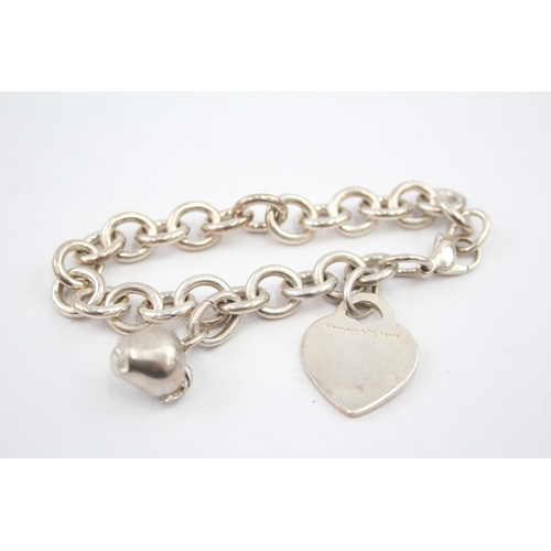 333 - Silver bracelet with heart tag and apple charm by designer Tiffany & Co (42g)