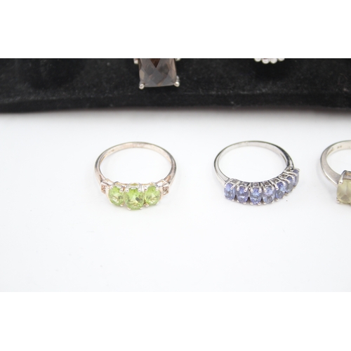 335 - A collection of silver gemstone rings including Opal (40g)