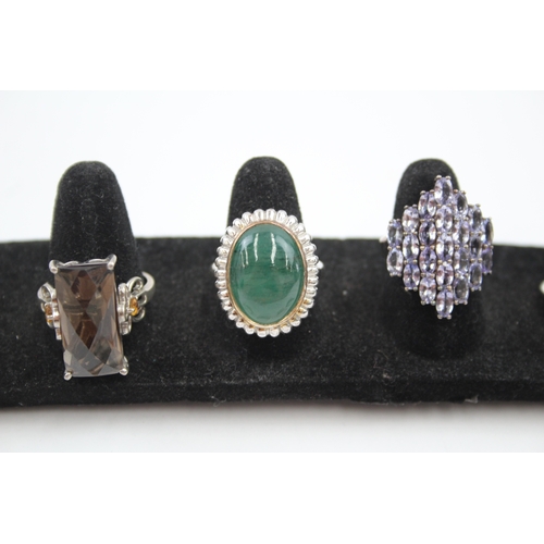 335 - A collection of silver gemstone rings including Opal (40g)