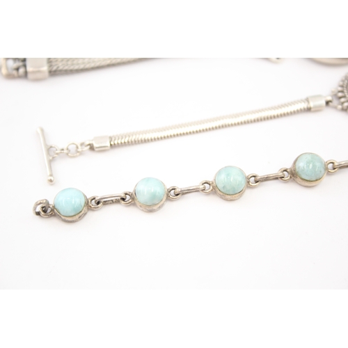 336 - Three silver gemstone bracelets including Larimar (55g)