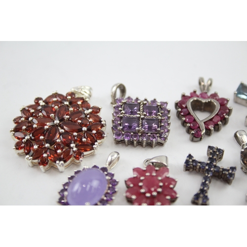 342 - A collection of silver gemstone pendants including Ruby (39g)