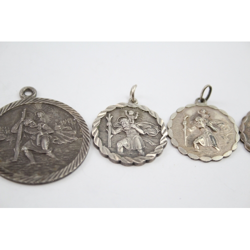 343 - Five silver St Christopher pendants including Georg Jensen (46g)