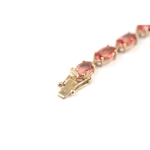 4 - 9ct gold red gemstone link bracelet (5.7g)