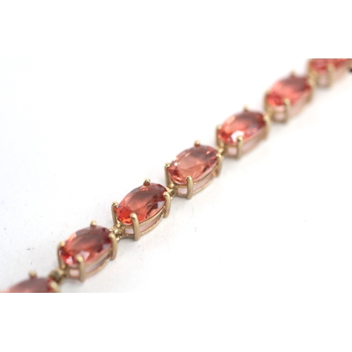 4 - 9ct gold red gemstone link bracelet (5.7g)