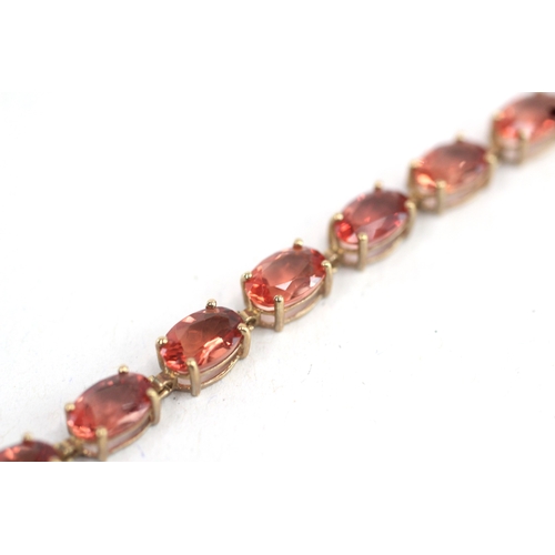 4 - 9ct gold red gemstone link bracelet (5.7g)