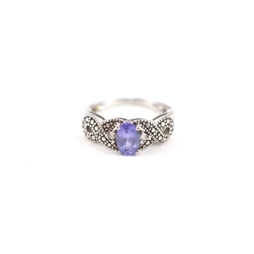 48 - 9ct white gold tanzanite single stone ring with diamond sides (2.2g) Size  J 1/2