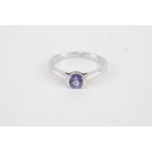 52 - 10ct white gold round tanzanite single stone ring (2g) Size  L  1/2