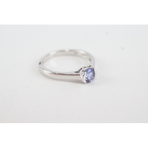 52 - 10ct white gold round tanzanite single stone ring (2g) Size  L  1/2