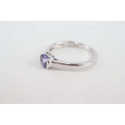 52 - 10ct white gold round tanzanite single stone ring (2g) Size  L  1/2